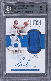 2018-19 National Treasures Clutch Factor Jersey Signatures #47 Luka Doncic Signed Patch Rookie Card (#43/99) - BGS MINT 9/BGS 10